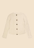 Cream-colored cable knit cardigan with buttons on a beige background