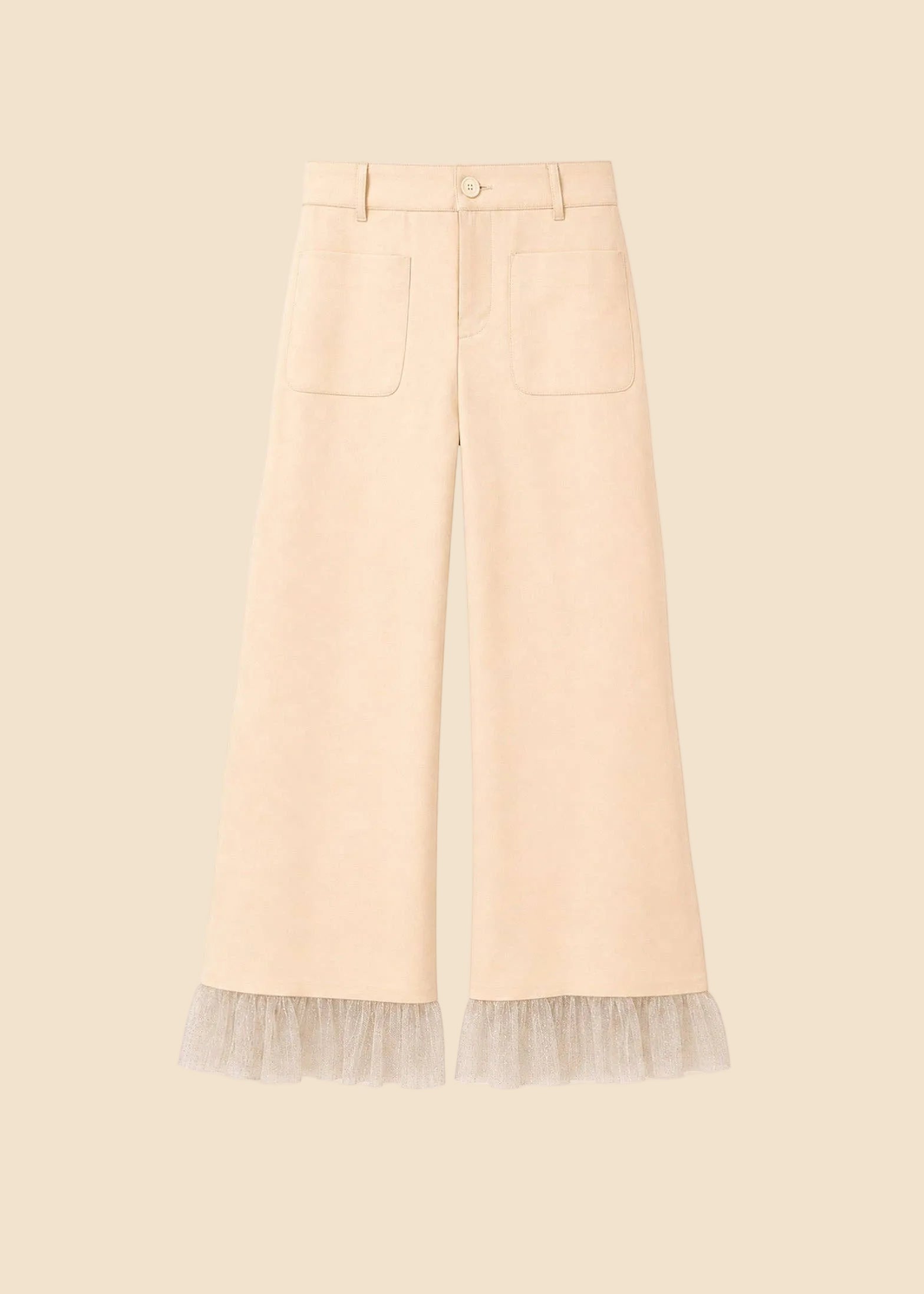 Beige pants with lace trim on a light pink background