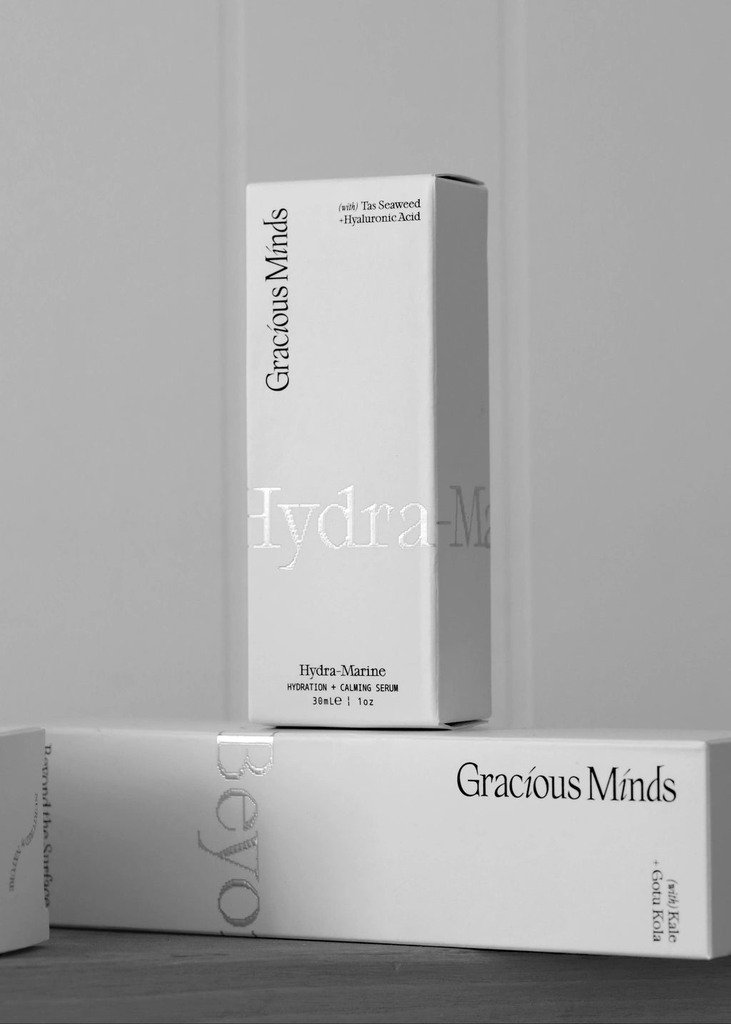 Two 'Gracious Minds' boxes on a gray background