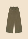 Green checkered pants on a light gray background
