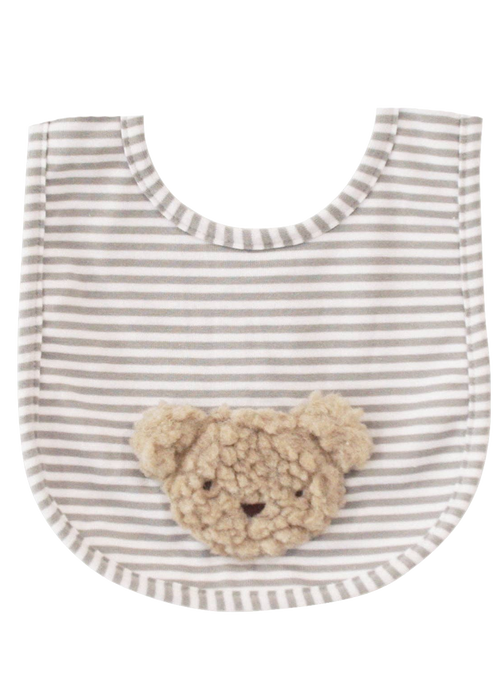 Striped bib with a teddy bear patch on a white background