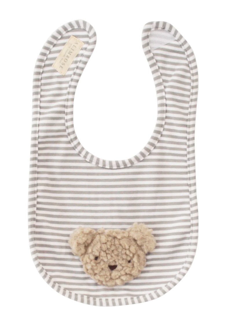 Striped bib with a teddy bear pocket on a white background