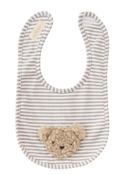 Striped bib with a teddy bear pocket on a white background
