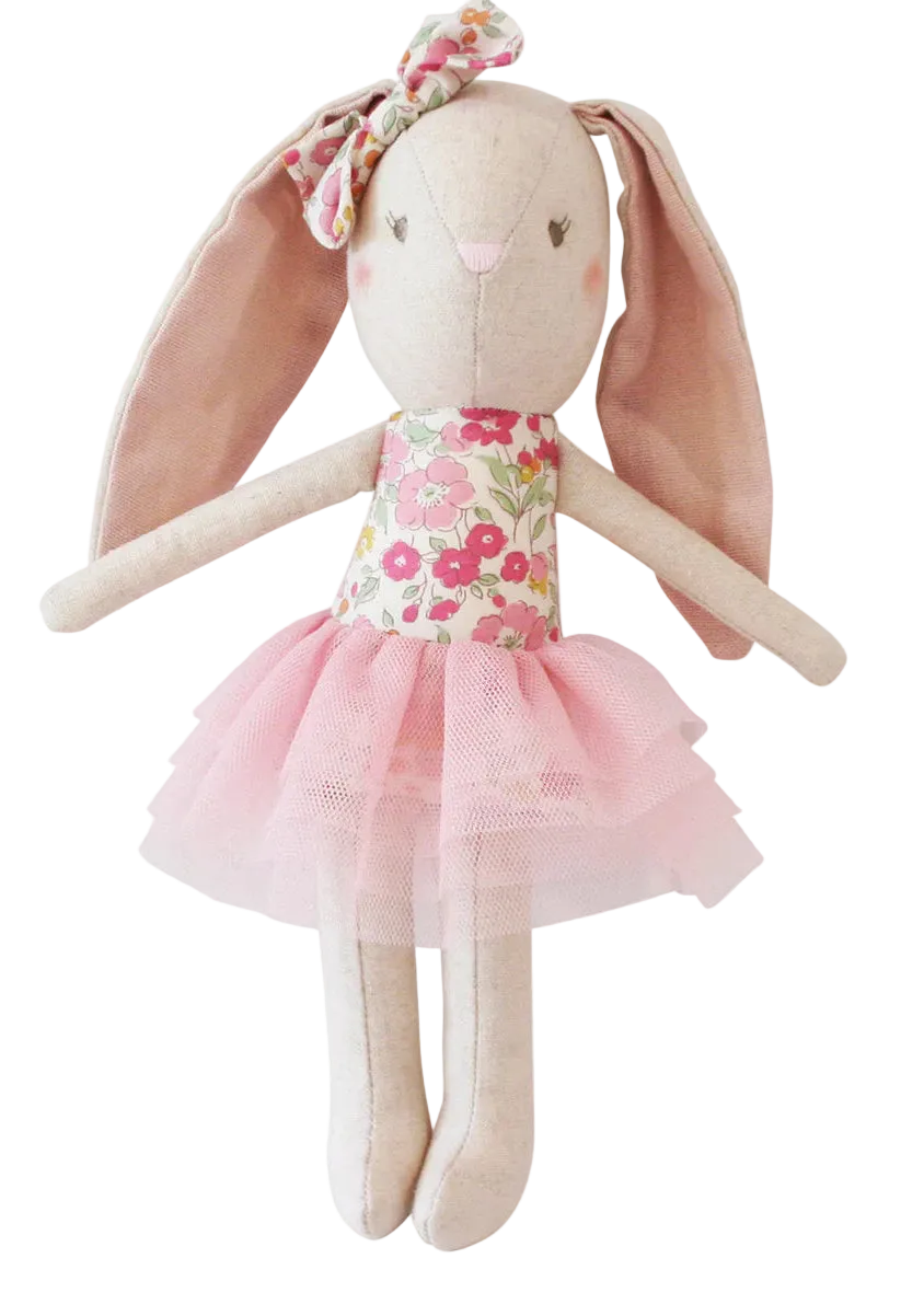 Stuffed bunny doll with floral dress and pink tutu on a white background