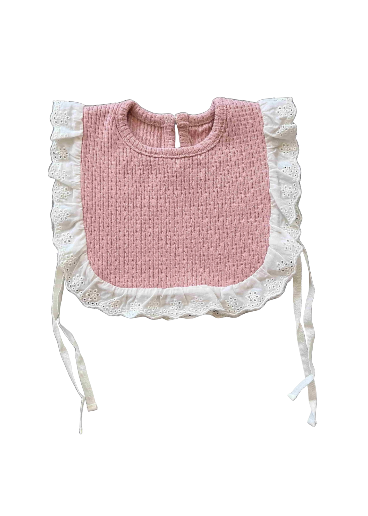 Pink bib with lace trim on a white background