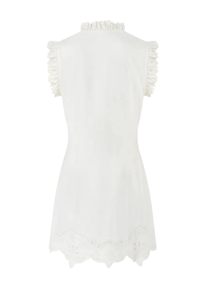 White sleeveless dress with ruffled details on a white background