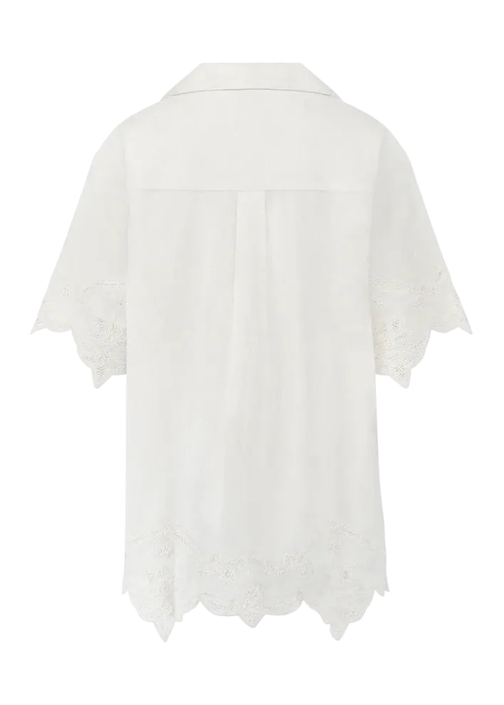 White lace top on a white background