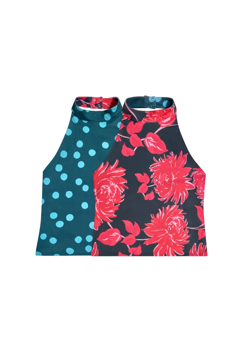 Two tank tops with different patterns on a light gray background
