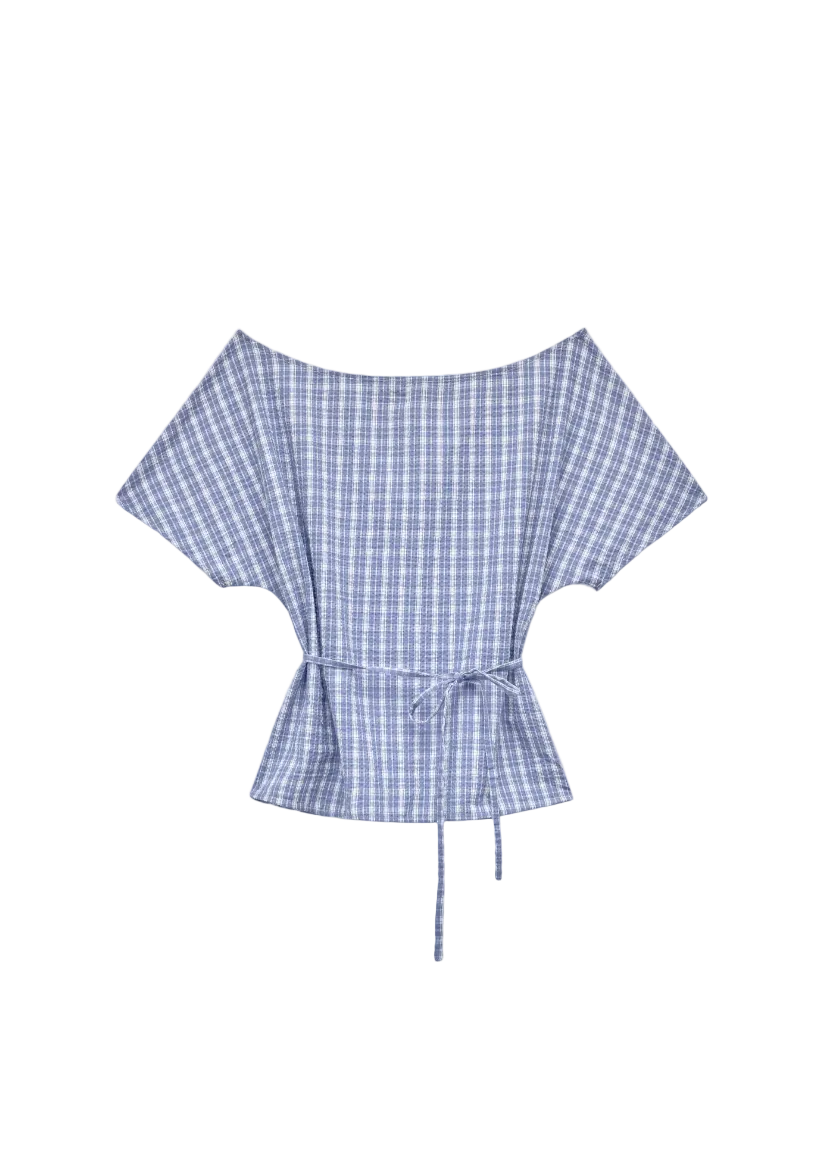 Blue and white checkered top with a tie detail on a light gray background