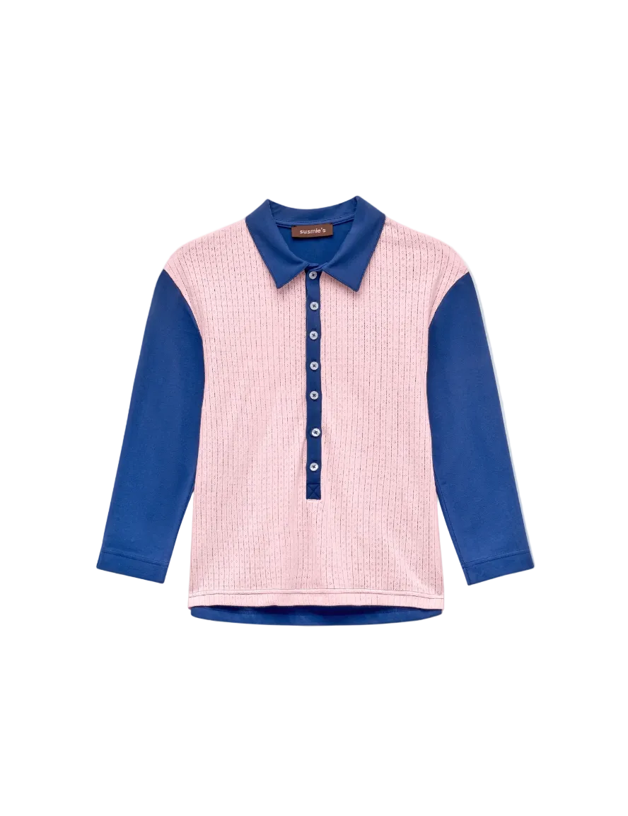 Pink and blue long-sleeve shirt with a collar on a light gray background