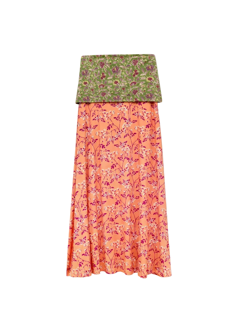 Two-layered skirt with green floral top and pink floral bottom on a white background