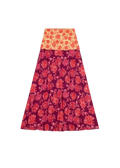 Floral patterned skirt with orange top and purple bottom on a white background