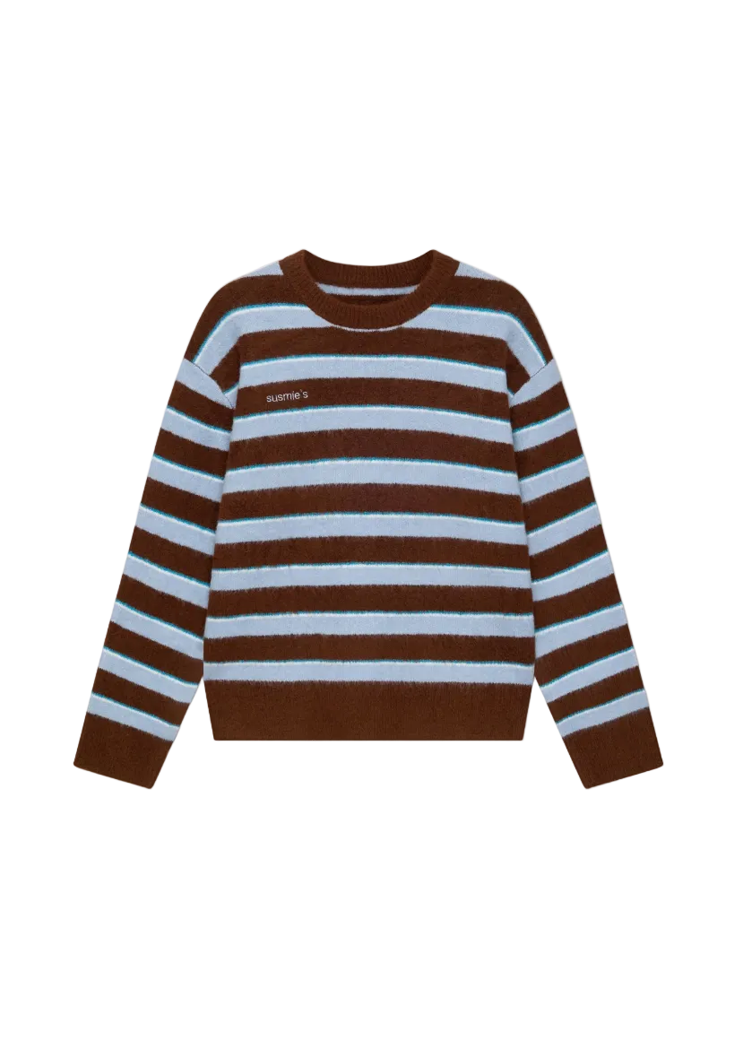 Brown and white striped sweater on a light gray background