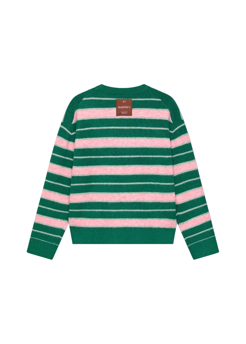 Green and pink striped sweater on a white background