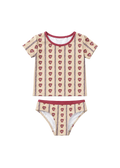 A two-piece baby swimwear set featuring a short-sleeve top and matching bikini briefs. The set has a beige background with vertical stripes of red hearts and thin dark blue lines, finished with a contrasting red trim.