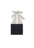 Black top with white polka dots and matching headscarf on a white background