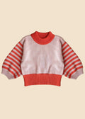 Pink and red striped sweater on a white background
