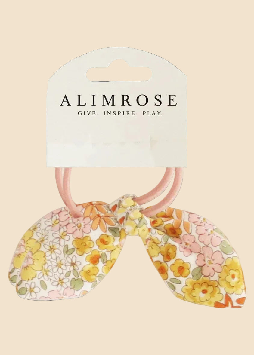 Floral hair scrunchie and rubber band set with Alimrose packaging on a white background