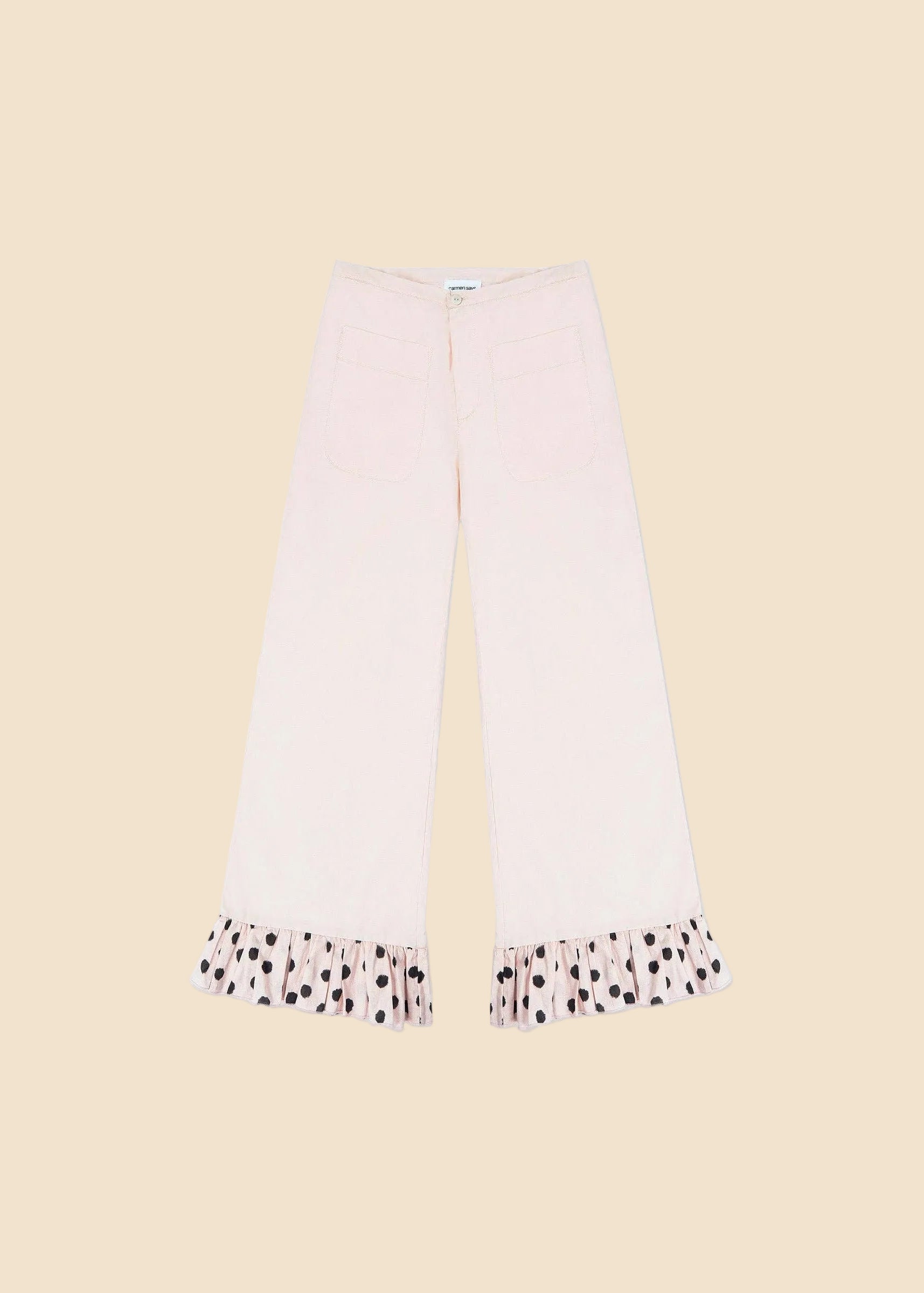 Pink pants with polka dot cuffs on a white background