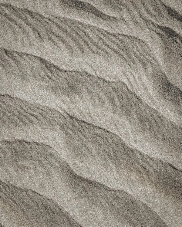 Close-up of textured gray fabric with wavy pattern